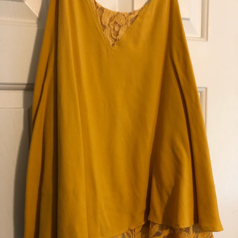 Francesca’s yellow tank top